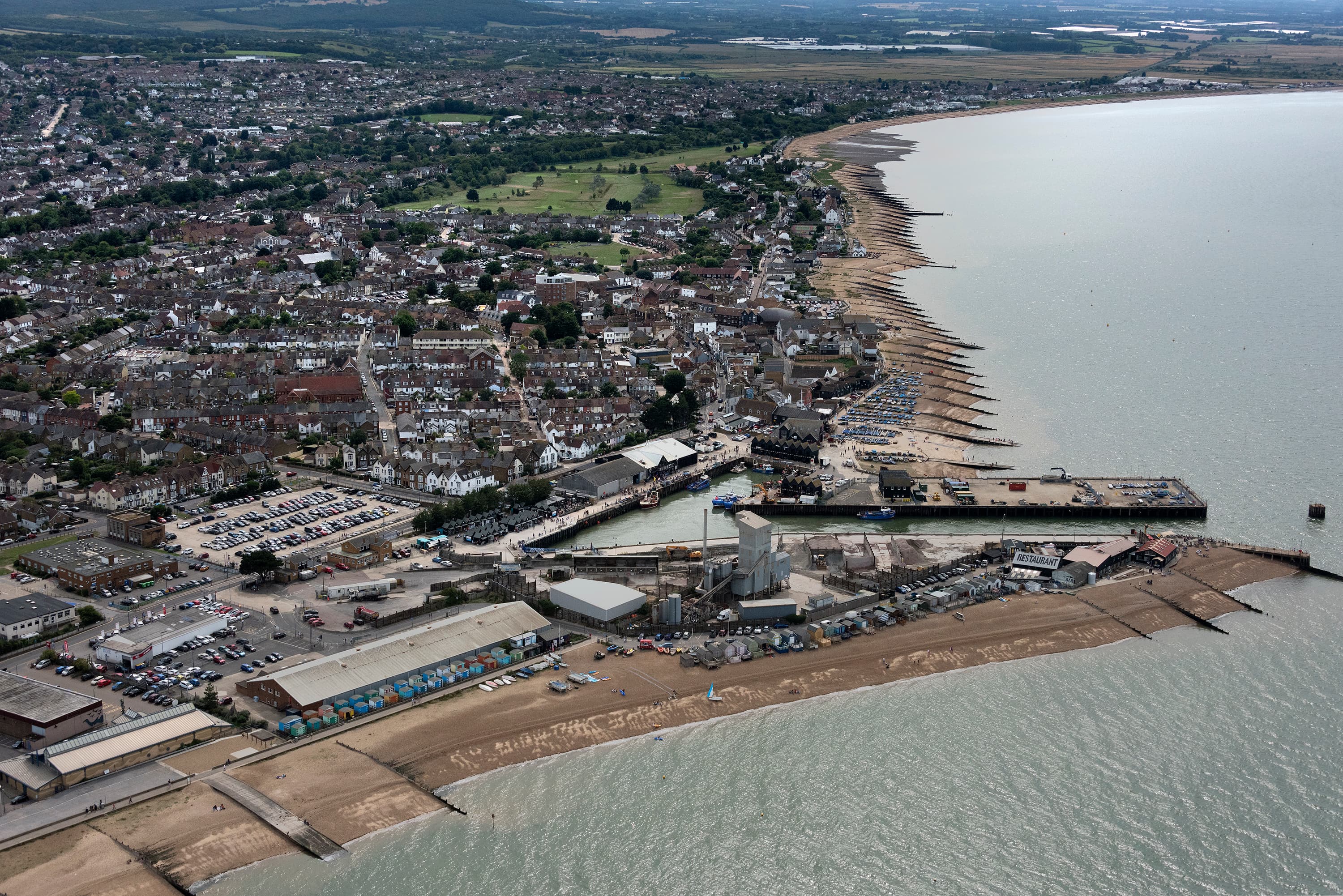 Aerial view of Whitstable town centre and coastline